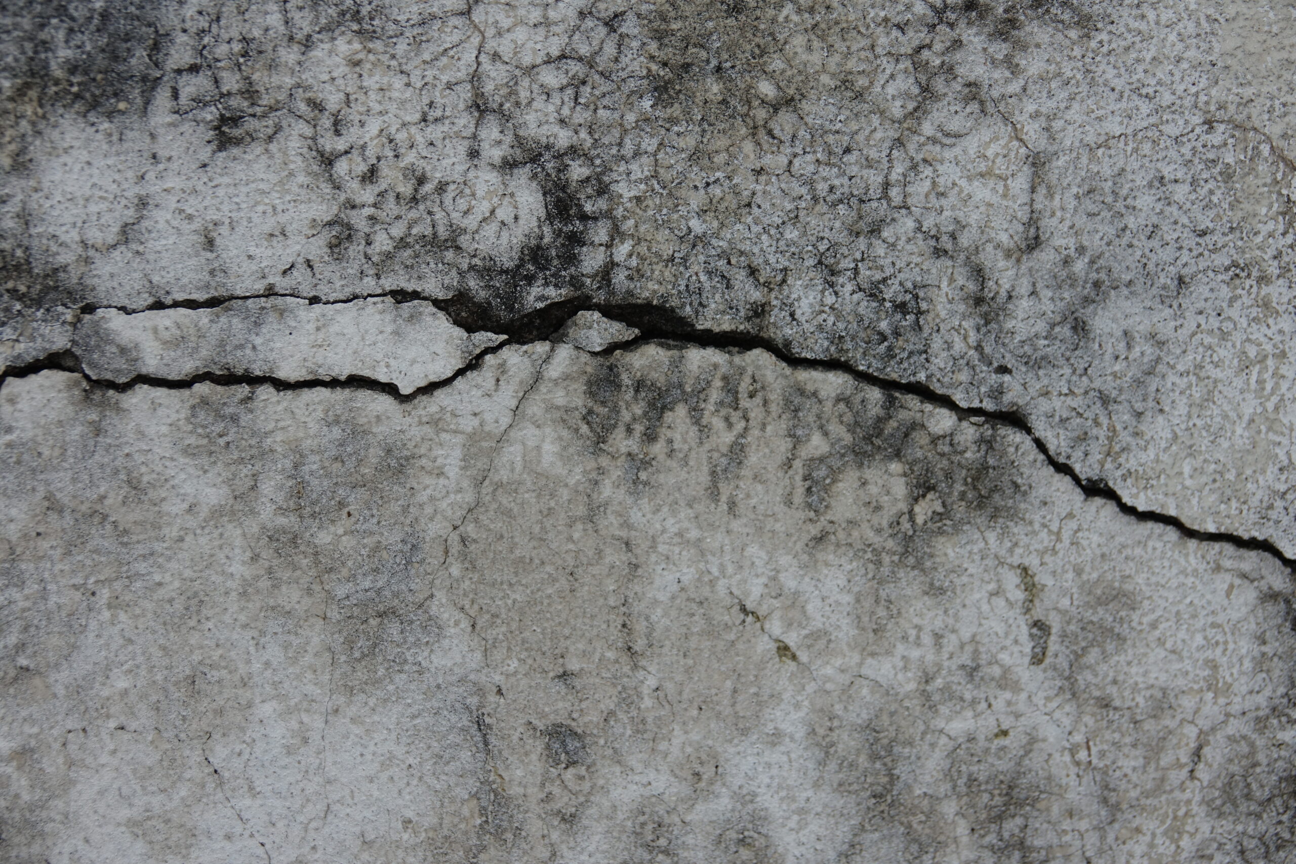 A badly spalled concrete surface