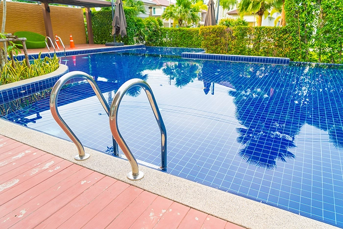 A pool deck in need of resurfacing in New York