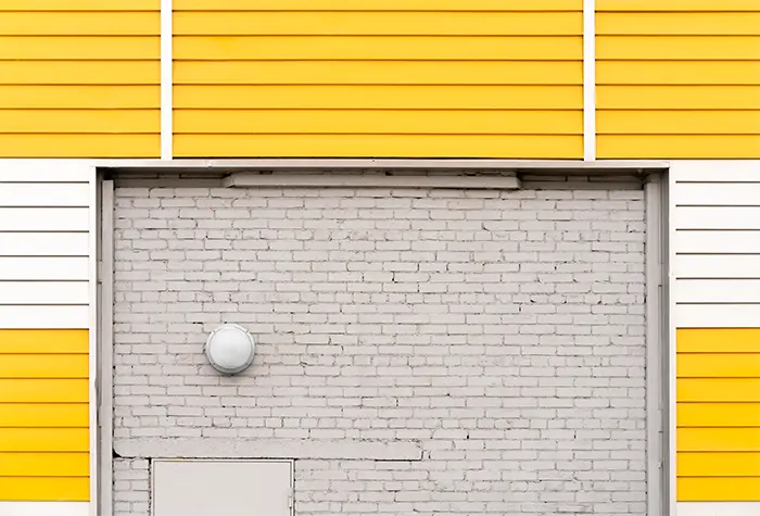 Exterior Wall Image - An exterior wall in focus with white painted bricks