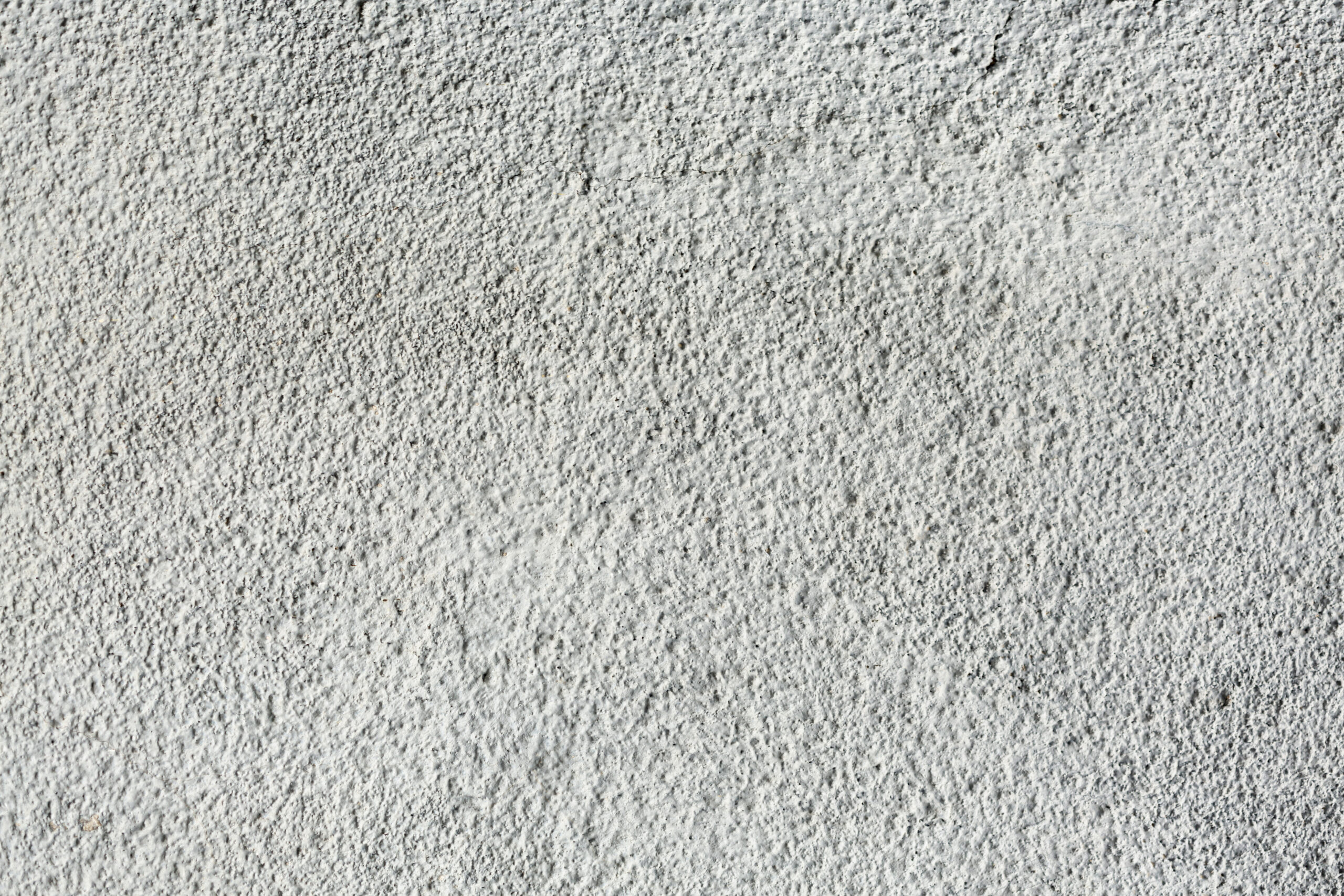 A close up of newly installed salt finished concrete surface in New York