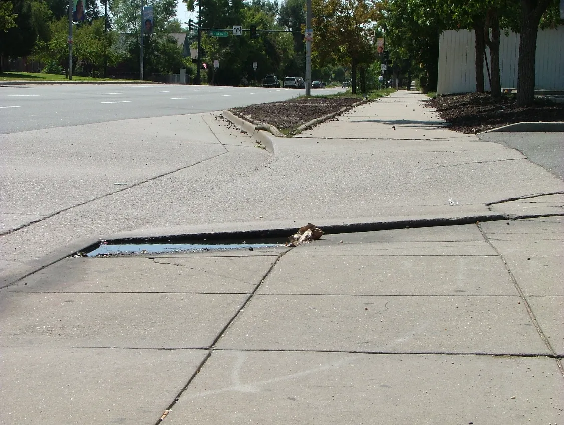 How to Fix Uneven Cement - A Picture of an Uneven Sidewalk