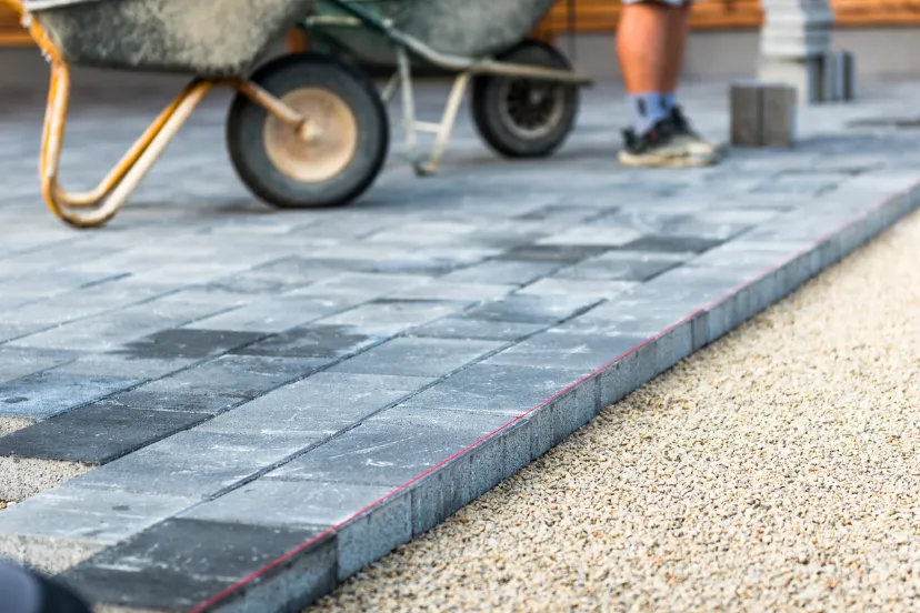 Brick Patio Repair Contractors in Long Island - A Picture of Workers Restoring a Brick Patio