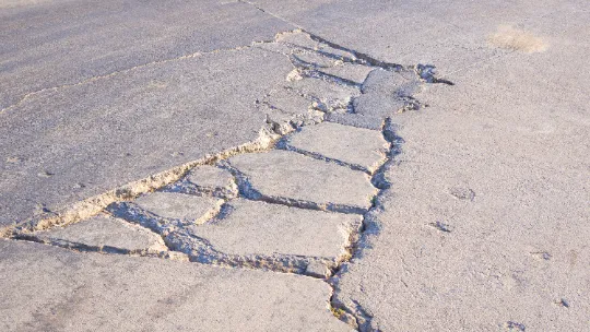 Commercial Parking Lot Repair Services Concrete Cracks from Constant Wear